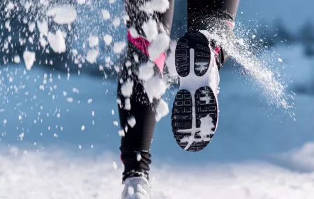 woman running in snow